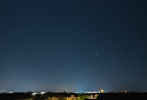 Night sky over Berlin, shooting star from the swarm of lyrids Night sky over Berlin, shooting star from the swarm of lyrids